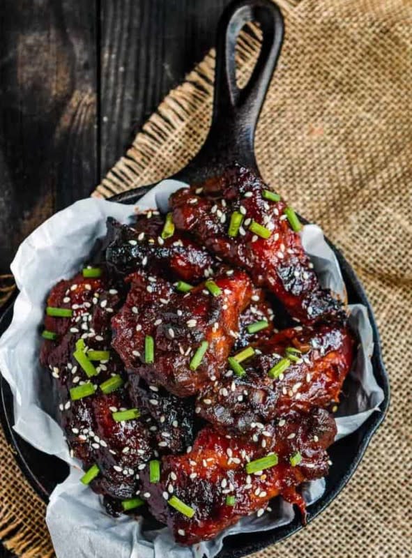 <p>Mommy's Home Cooking</p><p>These melt-in-your-mouth wings have an addicting sweet heat flavor.</p><p><strong>Get the recipe: <a href="https://mommyshomecooking.com/slow-cooker-pineapple-barbecue-chicken-wings/" rel="nofollow noopener" target="_blank" data-ylk="slk:Slow Cooker Pineapple Barbecue Chicken Wings;elm:context_link;itc:0;sec:content-canvas" class="link rapid-noclick-resp">Slow Cooker Pineapple Barbecue Chicken Wings</a></strong></p>