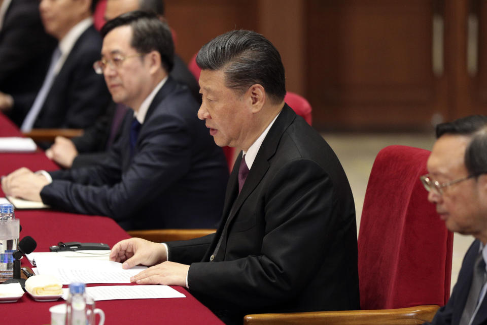 Chinese President Xi Jinping, center, talks with Russian President Vladimir Putin, unseen, during the meeting in Beijing, Friday, April 26, 2019. (Kenzaburo Fukuhara/Pool Photo via AP)