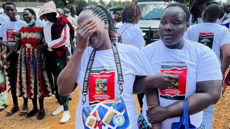 Agnes Cheptegei is assisted as she mourns her daughter and Olympian Rebecca Cheptegei, who died after her former boyfriend doused her in petrol and set her ablaze, at the Moi Teaching & Referral Hospital (MTRH) funeral home, in Eldoret, Kenya September 13, 2024