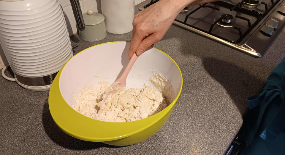 Mixing ingredients for no-knead bread