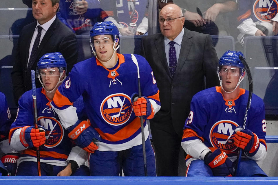 New York Islanders head coach Barry Trotz watches the game action during the second period of an NHL preseason hockey game against the New York Rangers, Saturday, Oct. 9, 2021, in Bridgeport, Conn. (AP Photo/Mary Altaffer)