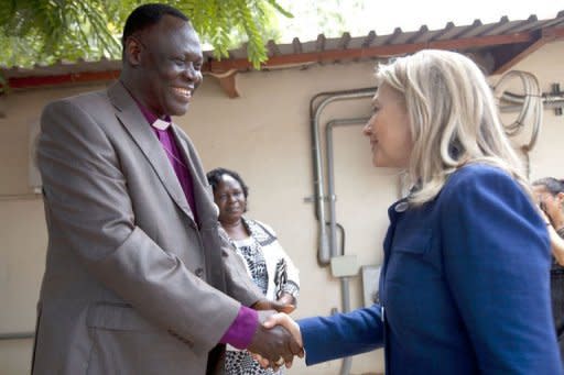 US Secretary of State Hillary Clinton (R) meets with Bishop Elias Taban in Juba, South Sudan. Clinton Friday paid tribute to a Ugandan human rights coalition working for gay rights, hours after a brief stop in Juba where she called for a compromise deal between the rival two Sudans