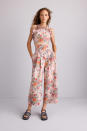 <p><i>A model in a floral jumpsuit. (Photo: ImaxTree) </i></p>