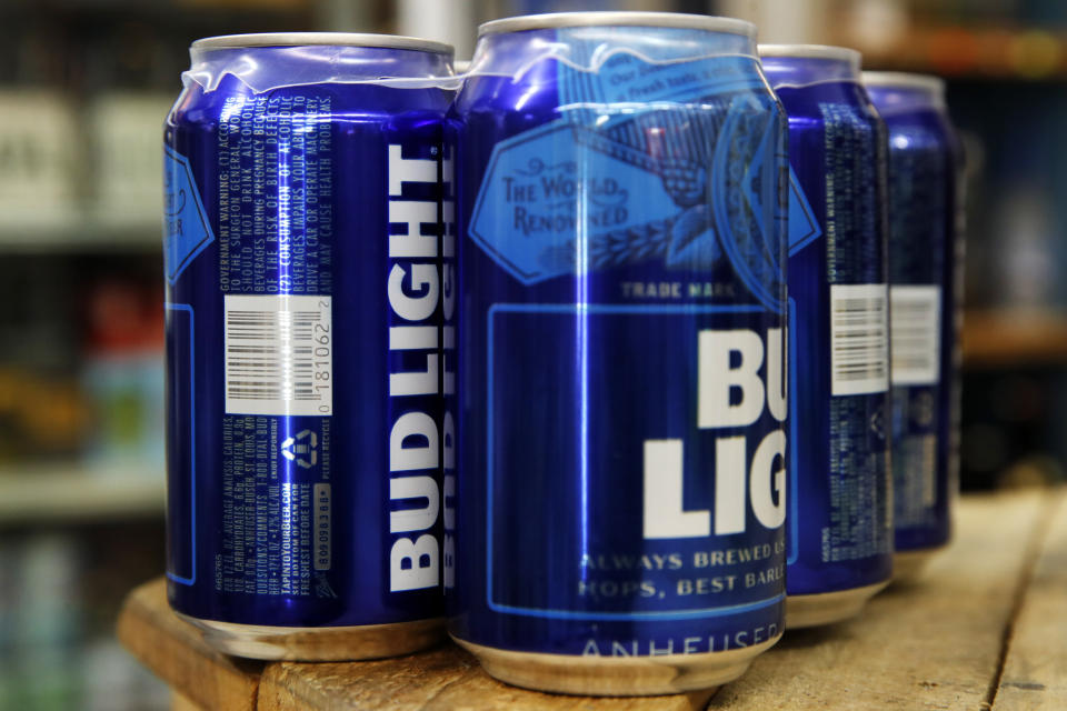 This Thursday, Jan. 10, 2019, photo shows cans of Bud Light in Washington. Starting next month, packages of Bud Light will have prominent labels showing the beer’s ingredients and calories as well as the amount of fat, carbohydrates and protein in a serving. Bud Light is likely the first of many to make the move. The labels aren’t legally required, but major beer makers agreed in 2016 to voluntarily disclose nutrition facts on their products by 2020. (AP Photo/Jacquelyn Martin)