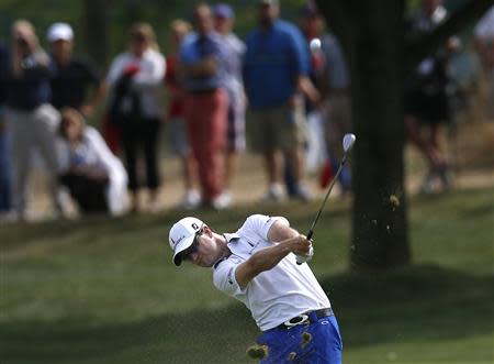 Zach Johnson of U.S. hits from the ninth fairway during the third round of the BMW Championship golf tournament at the Conway Farms Golf Club in Lake Forest, Illinois, September 14, 2013. REUTERS/Jim Young