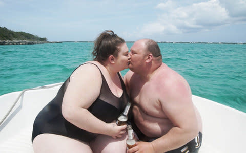 Married couple Ami (24.5 stone) and Adam (22.5 stone) from Stoke On Trent take a boat trip together during My 18-30 Holiday - Credit: ITV