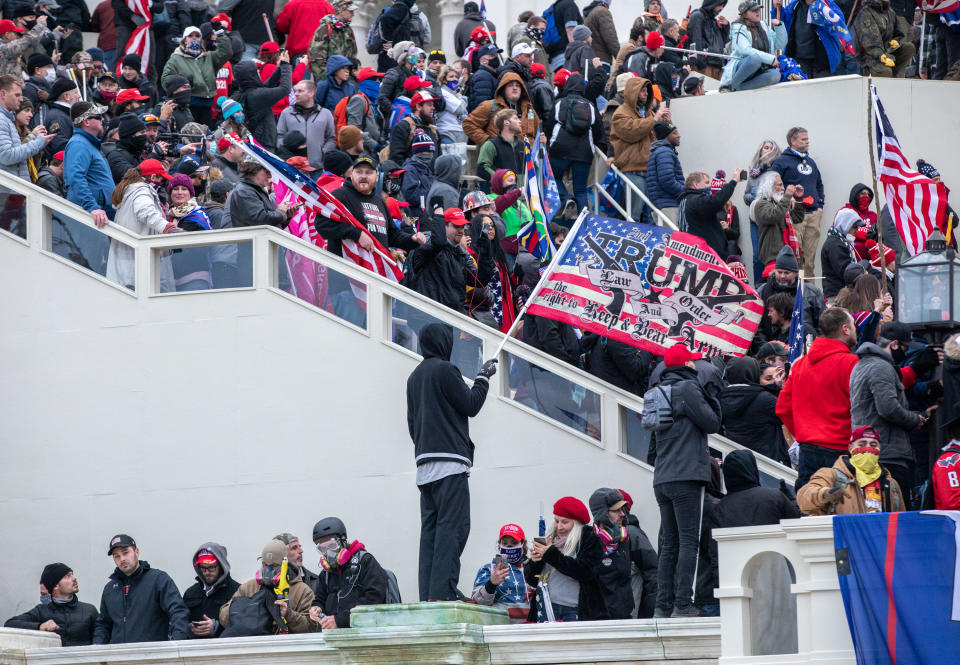 WASHINGTON,DC-JAN6: Tear gas is fired at supporters of President Trump who stormed the United States Capitol building.  (Photo by Evelyn Hockstein/For The Washington Post via Getty Images)