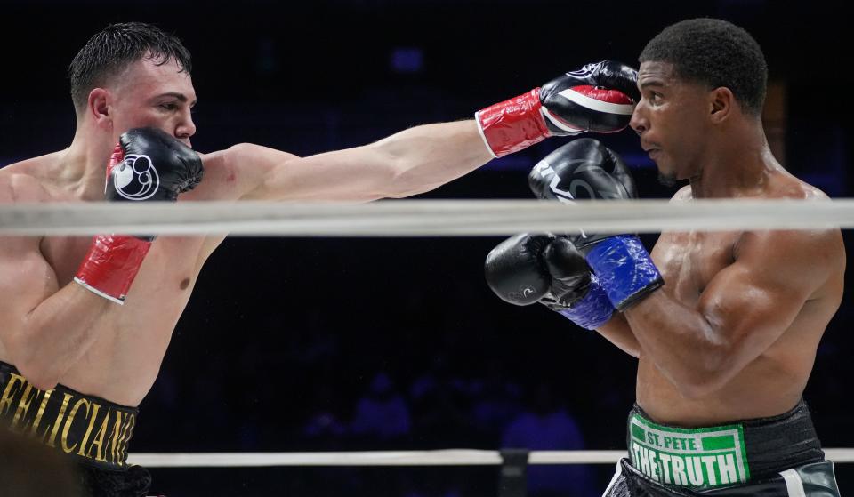 Luis Feliciano and Clarence Booth compete in Jorge Masvidal's Gamebred Boxing 143 pound weight class boxing match Saturday, April 1, 2023, at Fiserv Forum in Milwaukee.