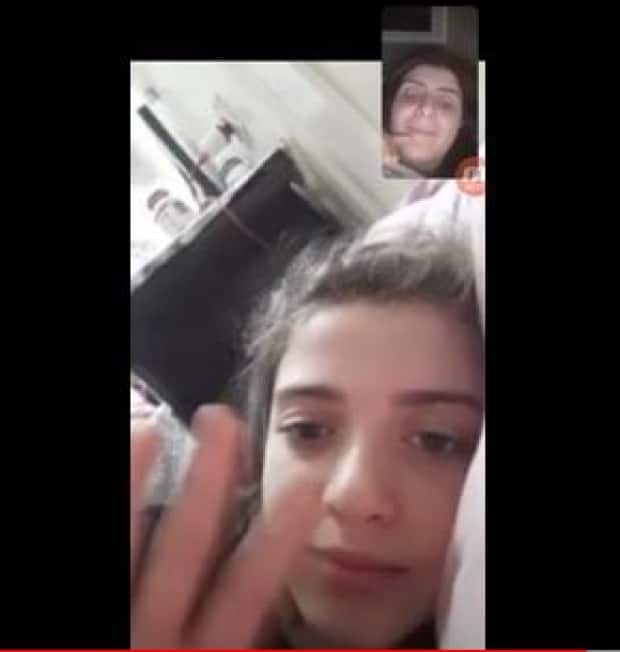 Jihan Qunoo (above) and her six-year-old daughter say good night through video phone apps. She is in Ottawa and her children are in Gaza where an escalating conflict with Israel has led to the deaths of at least 188 Palestinians.