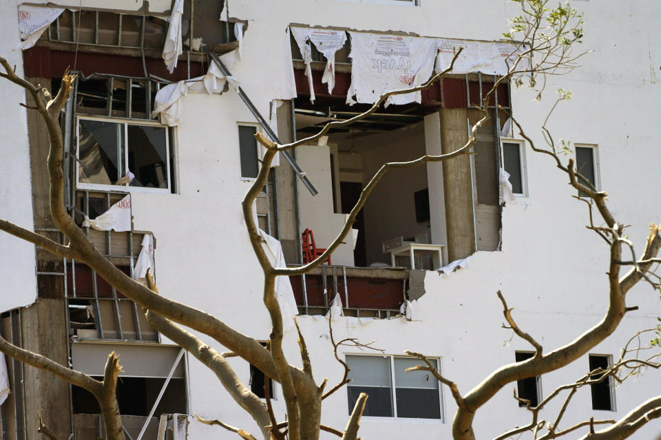 The walls of a hotel are partially gone two days after Hurricane Otis hit as a Category 5 storm in Acapulco, Mexico, Friday, Oct. 27, 2023. (AP Photo/Marco Ugarte)