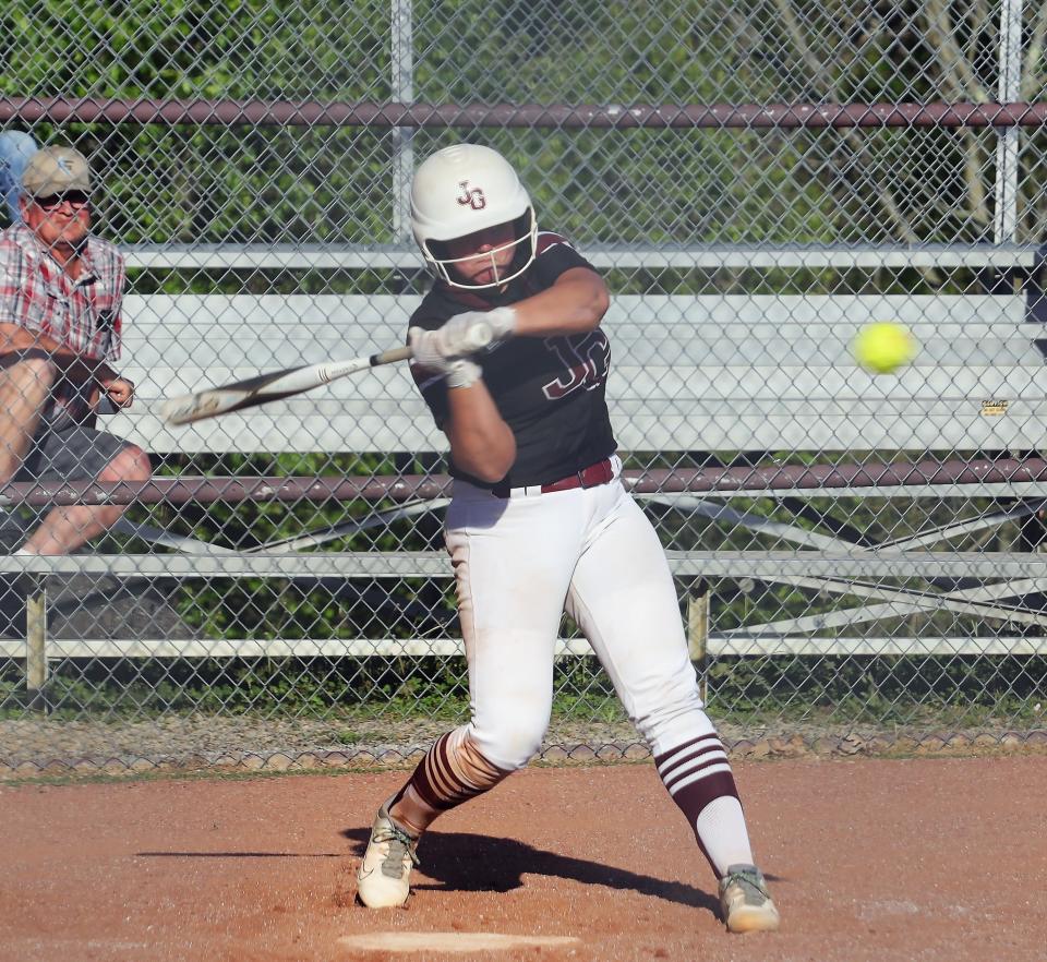 John Glenn's Alivia Boothe (10) swings during the Muskies versus Colts Softball game Thursday evening at John Glenn High School.- The Muskies held on for a hard fought 5-4 victory on Senior Night.