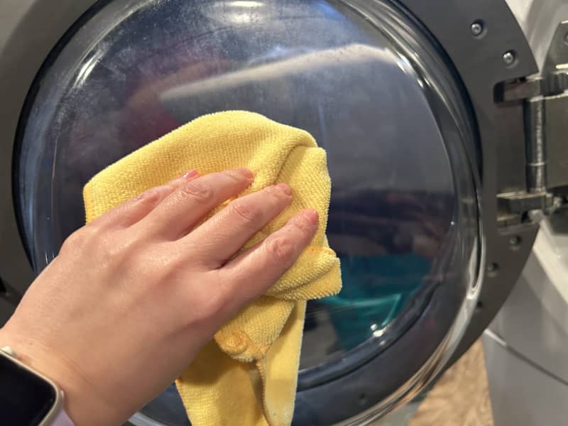 Cleaning a washing machine.
