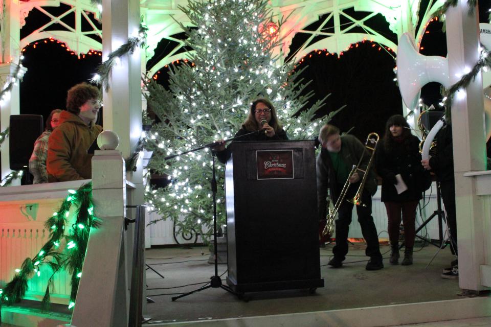 Bellville Mayor Terry Brenkus speaks at the Yule Log Celebration.