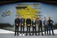 From L-R, riders Thibaut Pinot of France, Romain Bardet of France, Chris Froome of Britain, Richie Porte of Australia, Julian Alaphilippe of France, Tony Martin of Germany, Thomas Voeckler of France pose after the presentation of the itinerary of the 2017 Tour de France cycling race at a news conference in Paris, France, October 18, 2016. REUTERS/Benoit Tessier
