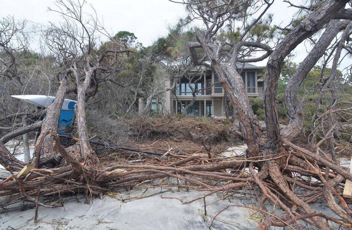 A catamaran, left, ended up on its side and entangled in these dead trees in front of a beachfront home along South Beach on Hilton Head Island after being washed there by the storm surge from Tropical Storm Irma on Monday. South Beach was badly eroded by Hurricane Matthew in 2016, and suffered another blow this year with Irma.