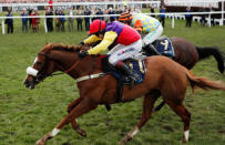 Horse Racing - Cheltenham Festival - Cheltenham Racecourse, Cheltenham, Britain - March 16, 2018 Native River ridden by Richard Johnson in action before winning the 15.30 Timico Cheltenham Gold Cup Chase Action Images via Reuters/Andrew Boyers