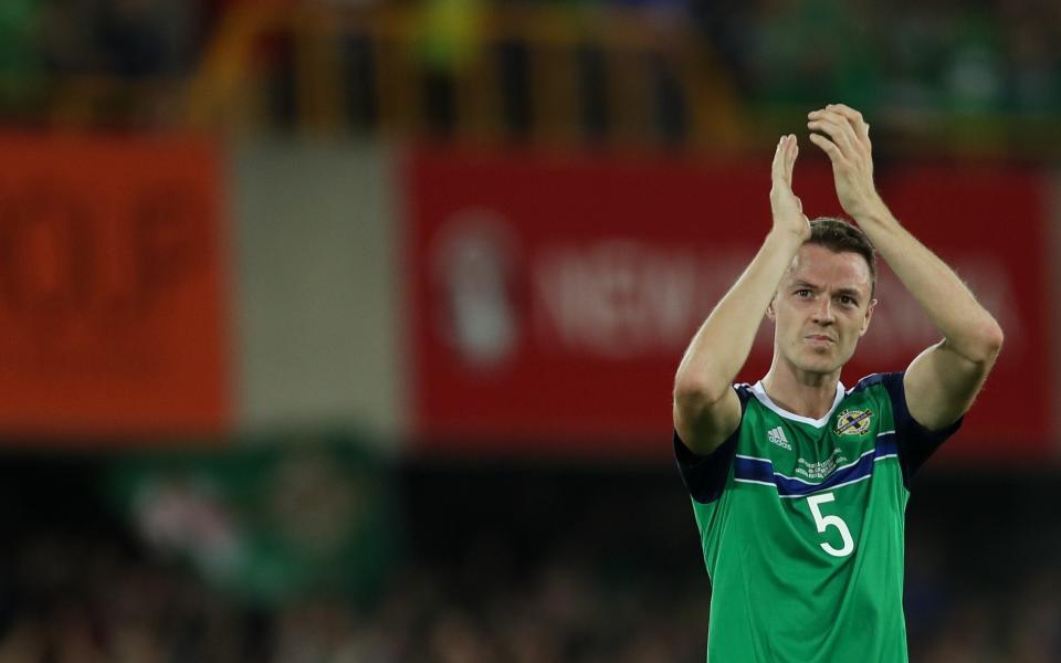 They might be giants: Jonny Evans and Northern Ireland have a shot at national hero status if they can defy the odds to reach Euros - Getty Images Europe