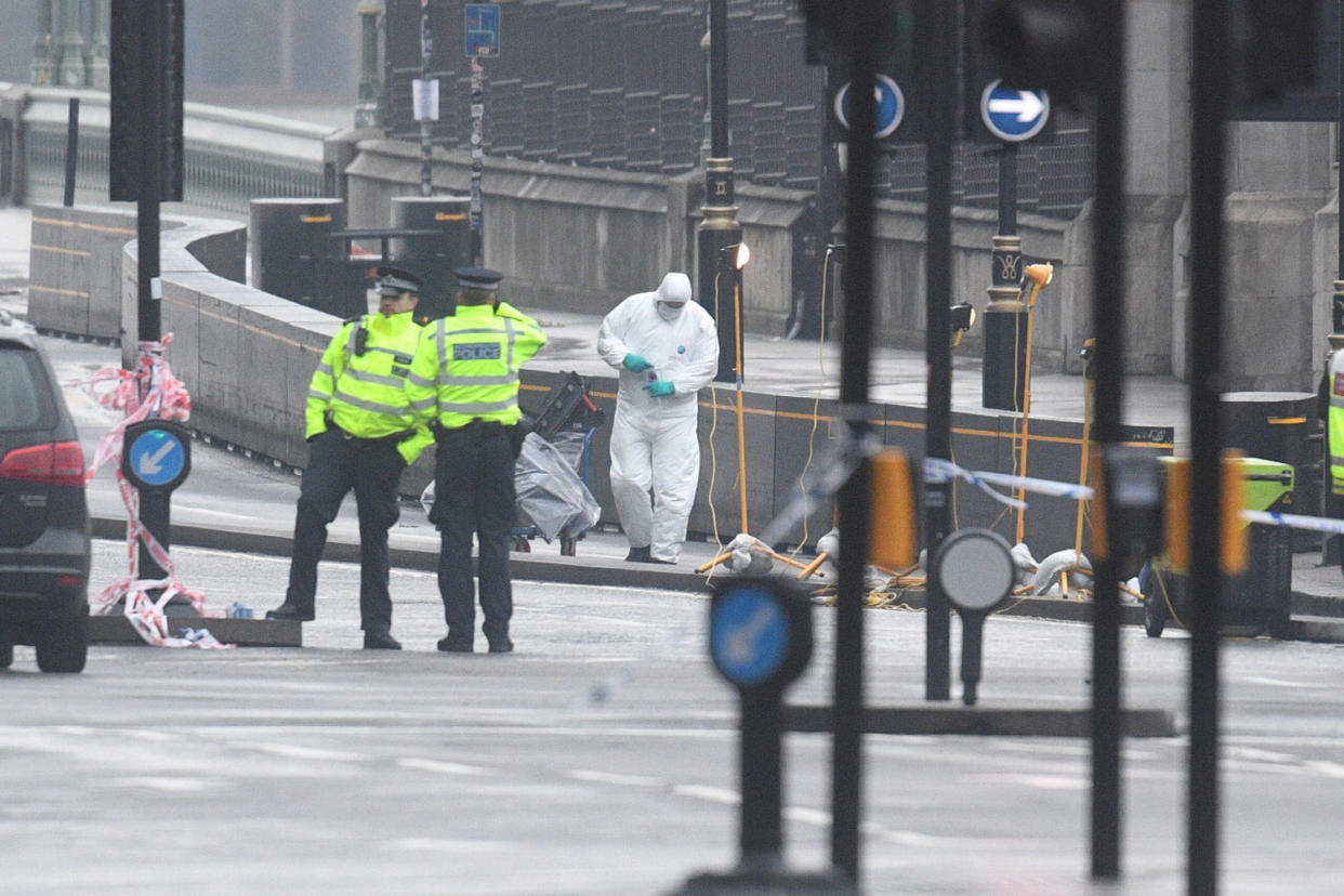 Forensic work: Specialists comb the scene of the attack: Jeremy Selwyn