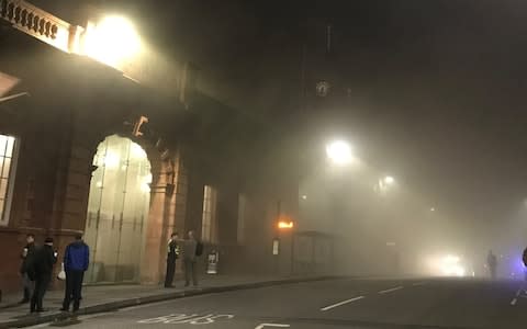 Smoke billows from Nottingham railway station early on Friday - Credit: Matthew Vincent /PA