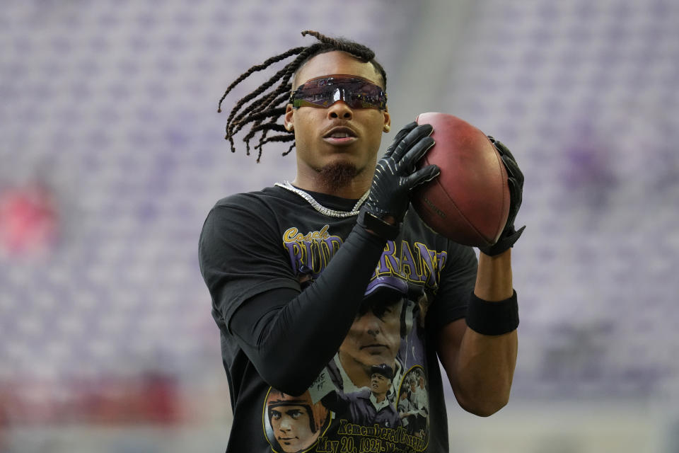 Minnesota Vikings wide receiver Justin Jefferson warms up before an NFL football game against the Tampa Bay Buccaneers, Sunday, Sept. 10, 2023, in Minneapolis. (AP Photo/Abbie Parr)