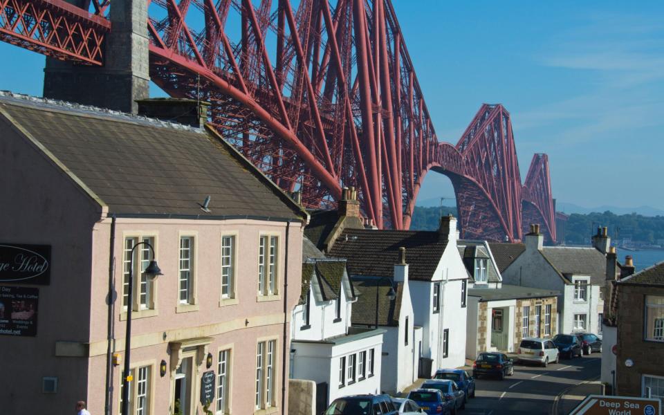 Forth Rail Bridge over houses