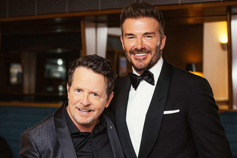 <p>Carlo Paloni/BAFTA/Getty</p> Michael J. Fox and David Beckham