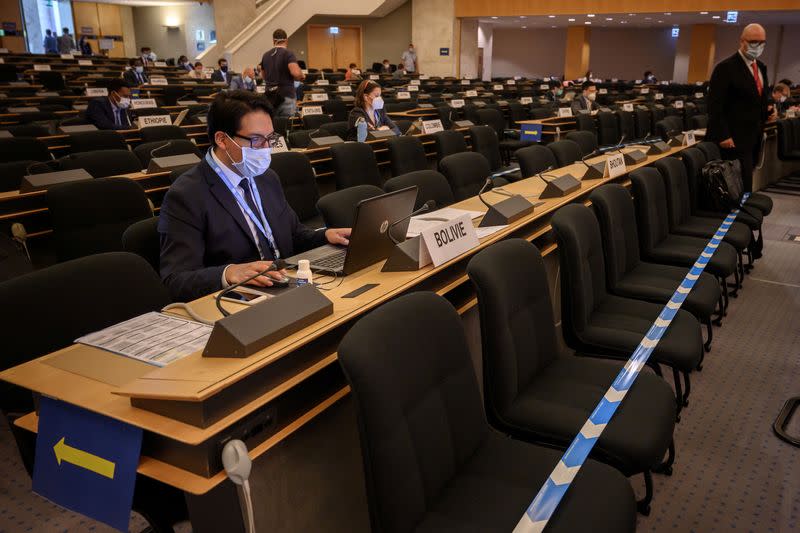 Delegates attend the resuming of a UN Human Rights Council session in Geneva