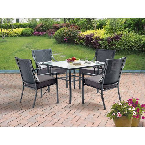 Glass-Topped Table and Cushioned Chairs