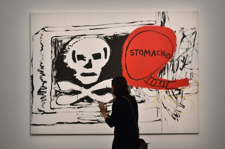 Milan's show features some of Jean-Michel Basquiat's child-like skull and crown paintings, his poetic and enigmatic anatomical depictions and his ceramics