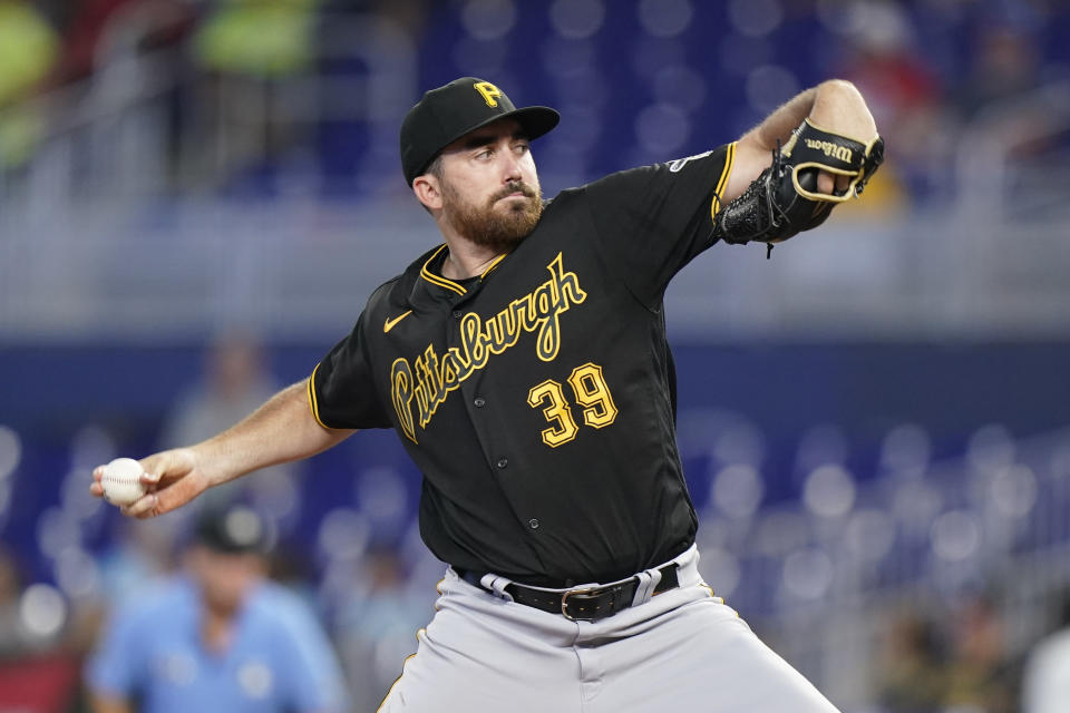Pittsburgh Pirates' Zach Thompson delivers a pitch during the first inning of a baseball game against the Miami Marlins, Thursday, July 14, 2022, in Miami. (AP Photo/Wilfredo Lee)