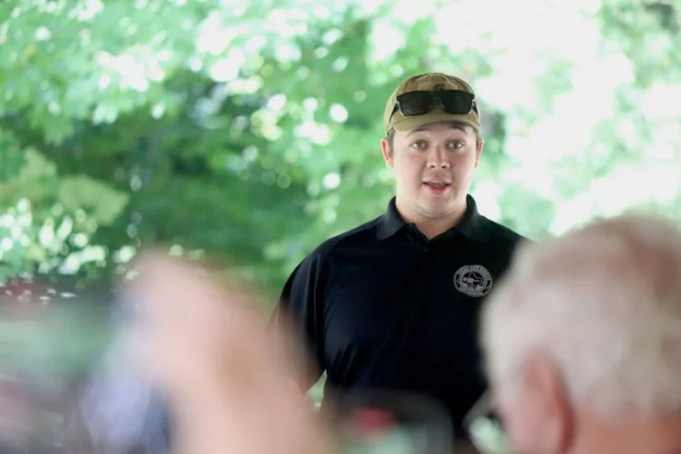 Kyle Rittenhouse speaks to a group of about 40 attendees Wednesday, July 19, at Pottawattomie Park in Grand Haven Township.