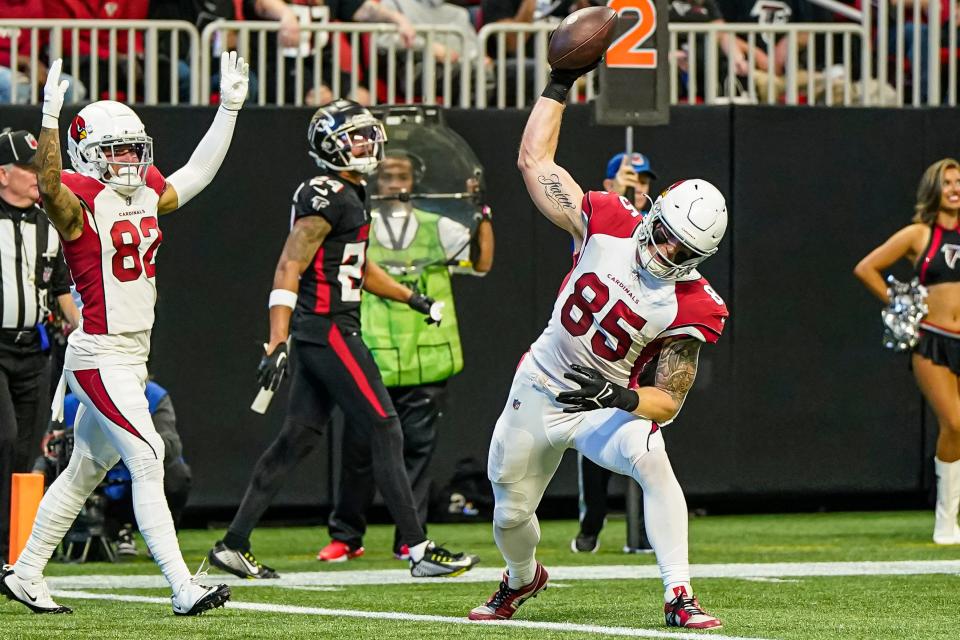 Jan 1, 2023; Atlanta, Georgia, USA; Arizona Cardinals tight end Trey McBride (85) spikes the ball after scoring a touchdown against the Atlanta Falcons during the first half at Mercedes-Benz Stadium.