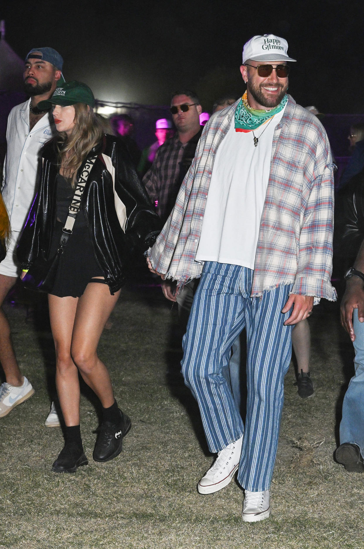 Taylor Swift and Travis Kelce at Neon Carnival held during the Coachella Music and Arts Festival on April 13, 2024 in Thermal, California. (Gilbert Flores / WWD via Getty Images)