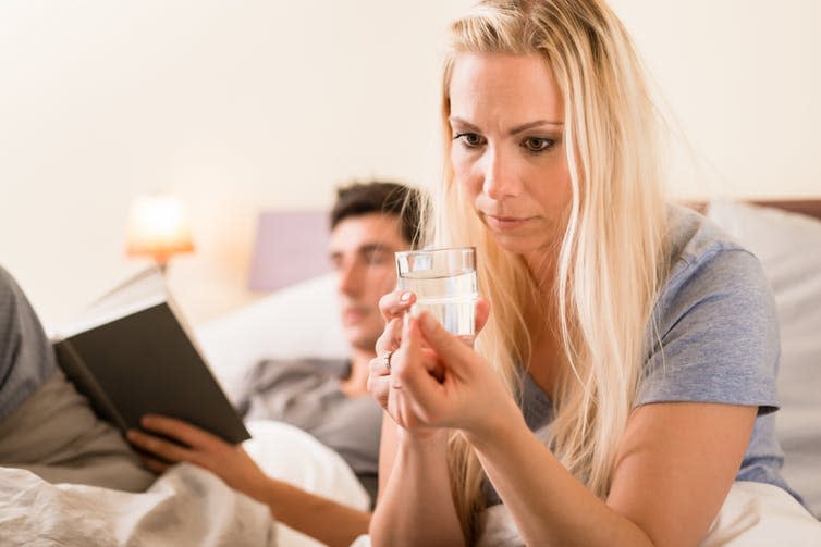 <span class="caption">Still women’s work.</span> <span class="attribution"><a class="link " href="https://www.shutterstock.com/image-photo/young-worried-woman-sitting-bed-next-567668212?src=-wKGopVpw56iuS6yPp4RyQ-4-79" rel="nofollow noopener" target="_blank" data-ylk="slk:Shutterstock.;elm:context_link;itc:0;sec:content-canvas">Shutterstock.</a></span>