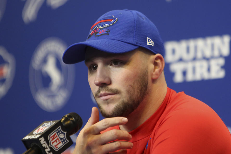 Buffalo Bills quarterback Josh Allen meets with reporters following an NFL football game against the Miami Dolphins in Orchard Park, N.Y., Saturday, Dec. 17, 2022. The Bills won 32-29. (AP Photo/Joshua Bessex)