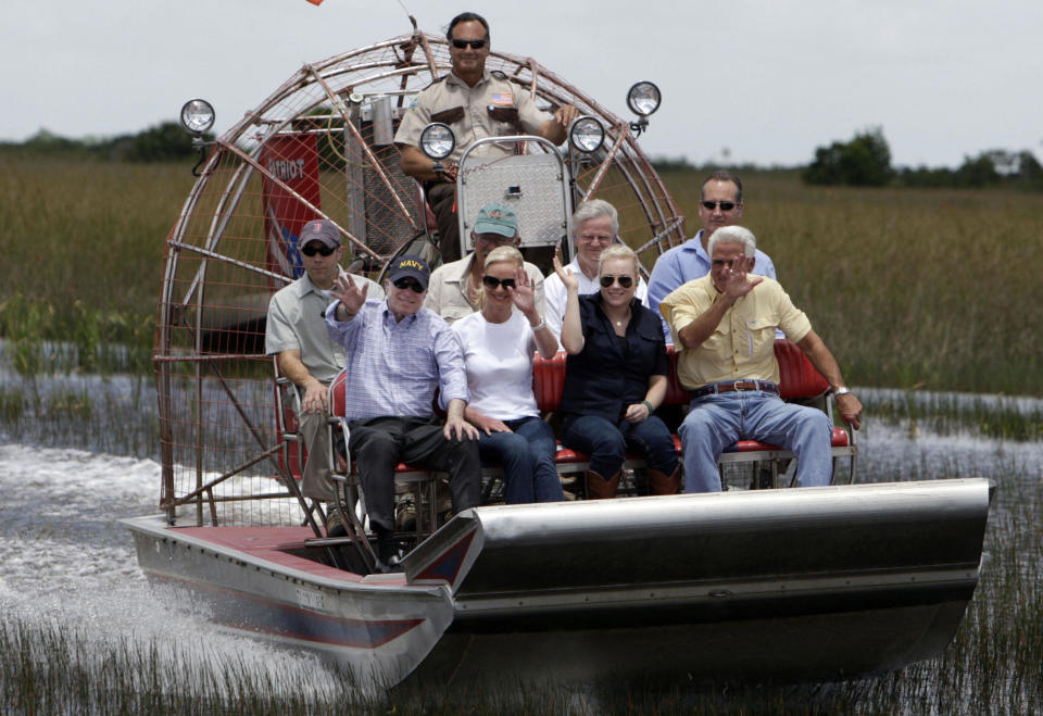 (L-R-front) Republican presidential candidate John McCain, wife Cindy McCain, daughter Meghan McCain, Florida Gov. Charlie Crist and  Rep. Mario Diaz-Balart (R-back) ,R-FL, ride on an airboat as they tour the Everglades Safari Park June 6, 2008 in Miami, Florida. The Everglades is the largest wetlands in North America.     AFP PHOTO/POOL/Charles Trainor, Jr.  (Photo credit should read Charles Trainor, Jr./AFP/Getty Images)