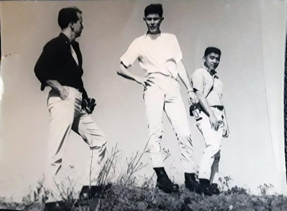 Jon Langione, center, in a photo with classmates in 1962.