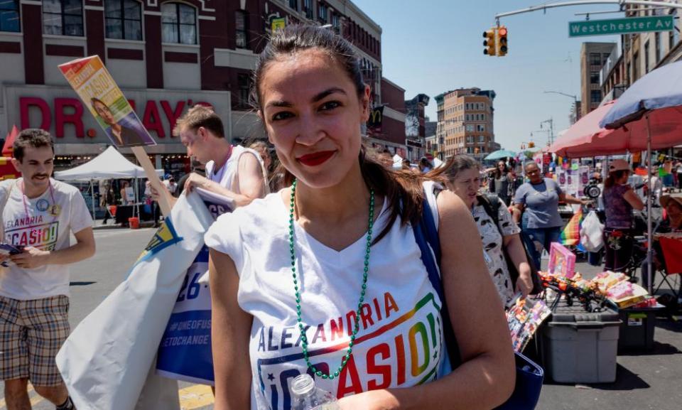 Alexandria Ocasio-Cortez marches during the Bronx’s pride parade two weeks ago.