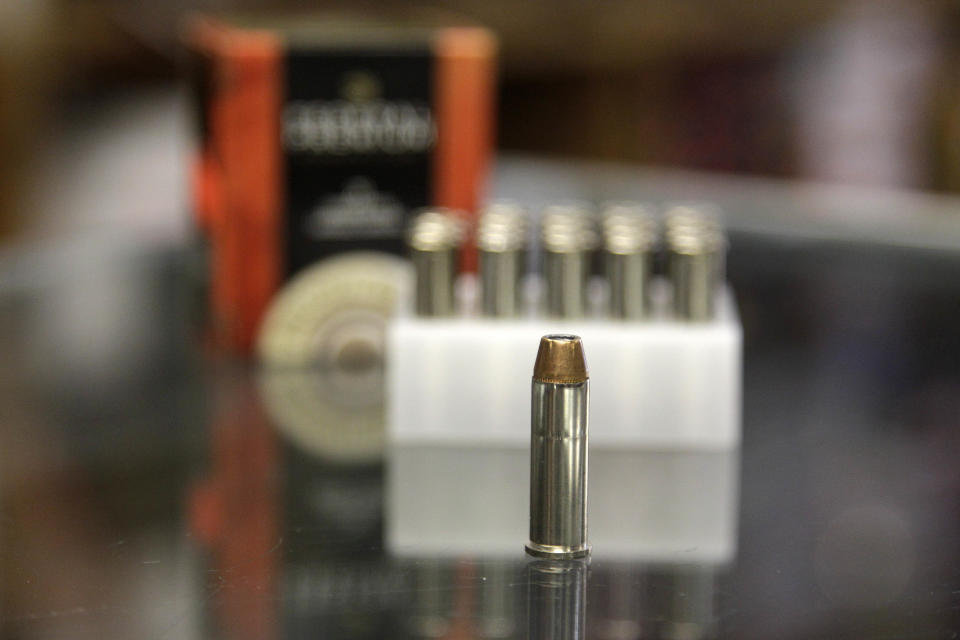 In this Wednesday, Oct. 17, 2012 photo, a box of ammunition is seen on the counter of a gun shop in Tinley Park, Ill. Cook County Board President Toni Preckwinkle is set to make official her latest tax target: bullets. On Thursday Oct. 18, she will propose a tax of five cents a bullet. and a dollar for a box of 20. (AP Photo/M. Spencer Green)