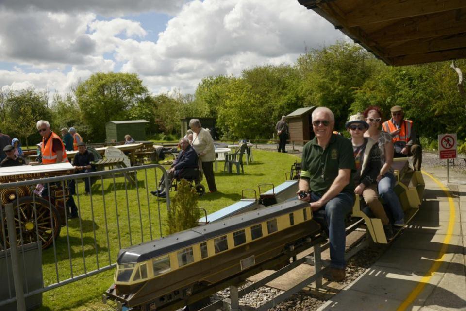 Wiltshire Times: Rob Atkins takes the GWR miniature diesel rail car out on the track at the West Wiltshire Society of Model Engineers public open day at Westbury. Image: Trevor Porter 77032-6