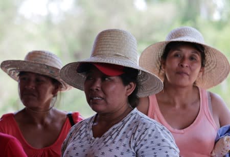 Women attend a meeting during the 10th Indigenous March to defend Mother Earth near San Jose