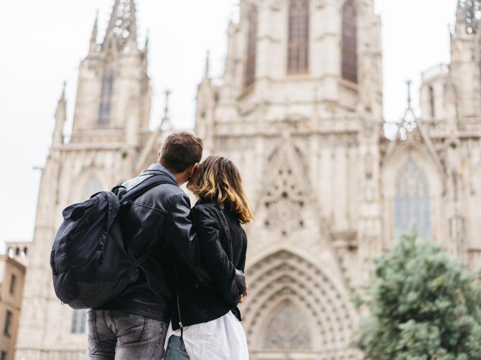 Couple standing.