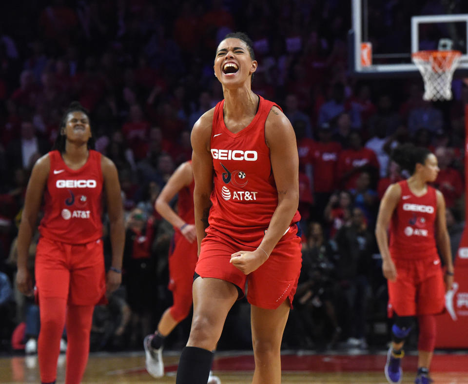 The Washington Mystics' Natasha Cloud celebrates after defeating the Connecticut Sun, 89-78, in Game 5 of the WNBA finals at Entertainment and Sports Arena in Washington, D.C., on Thursday, Oct. 10, 2019. (Brad Horrigan/Hartford Courant/Tribune News Service via Getty Images)