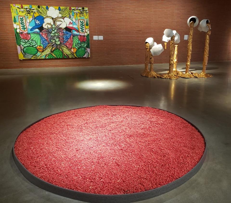 A thick circle of Flamin' Hot Cheetos laid out flat on the floor.