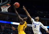 <p>Jayvon Graves #3 of the Buffalo Bulls reaches to block Luguentz Dort #0 of the Arizona State Sun Devils during the first half of the first round game of the 2019 NCAA Men’s Basketball Tournament at BOK Center on March 22, 2019 in Tulsa, Oklahoma. </p>