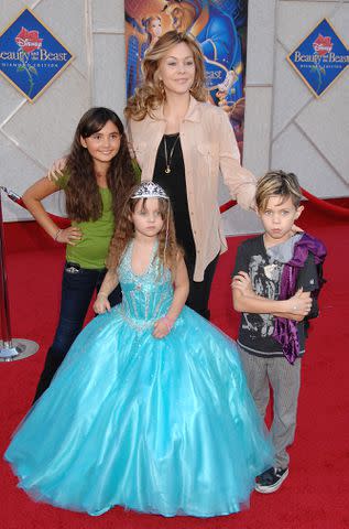 <p>Jeffrey Mayer/WireImge</p> Shanna Moakler and children Alabama Barker (front), Atiana de la Hoya (left) and Landon Barker (right) in 2010