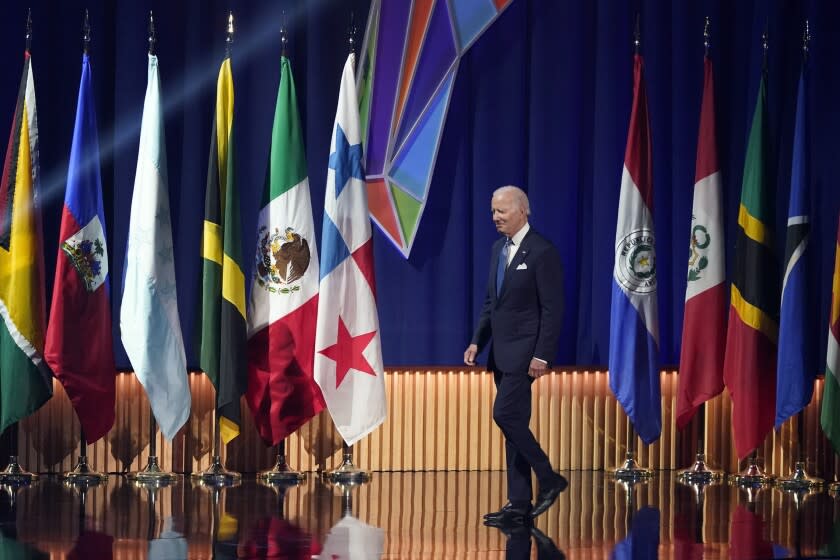 President Joe Biden walks to the podium to speak during the opening ceremony at the Summit of the Americas Wednesday, June 8, 2022, in Los Angeles. (AP Photo/Marcio Jose Sanchez)