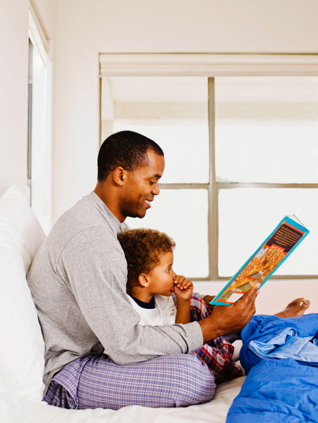 father reading bedtime story