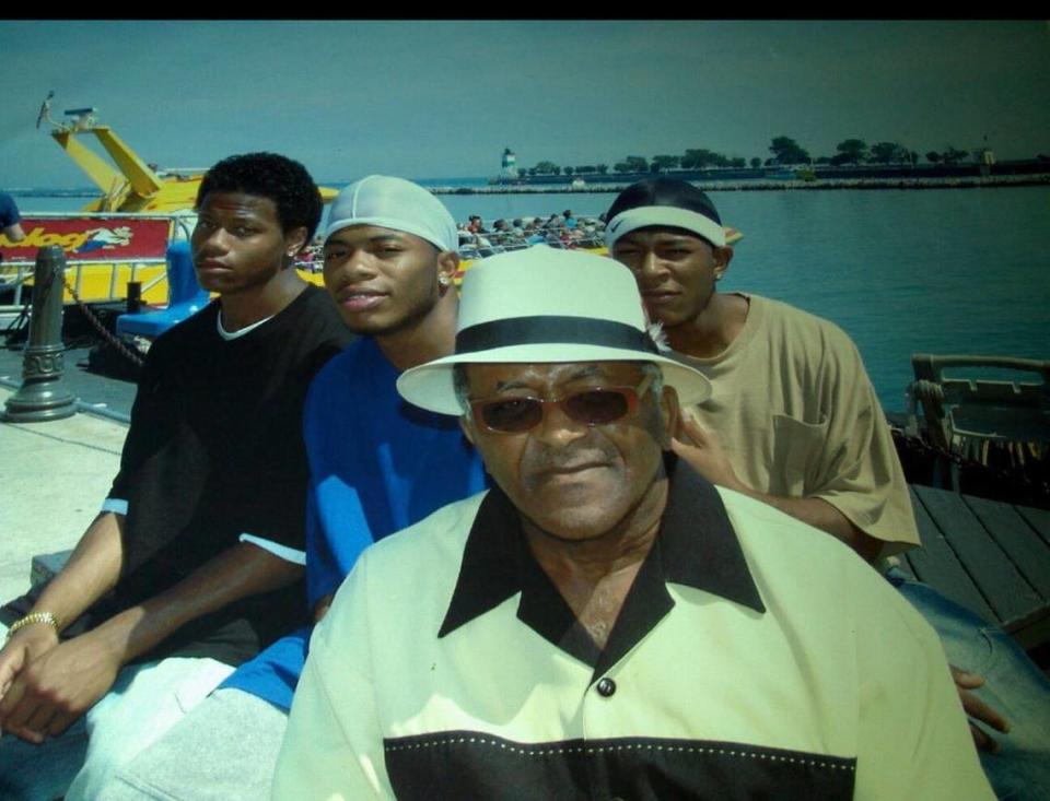 Grant Hopkins with his three grandsons, Robert, Ronnell and Ricky Hopkins.