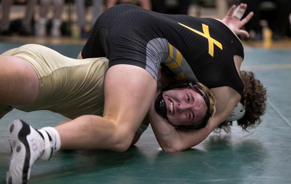 St. John Vianney's Michael Foley has Brick Memorial's Cory Martin on his back during his win by technical fall at 215 pounds in the Lancers' 40-31 win Thursday night in a Shore Conference Tournament quarterfinal match.